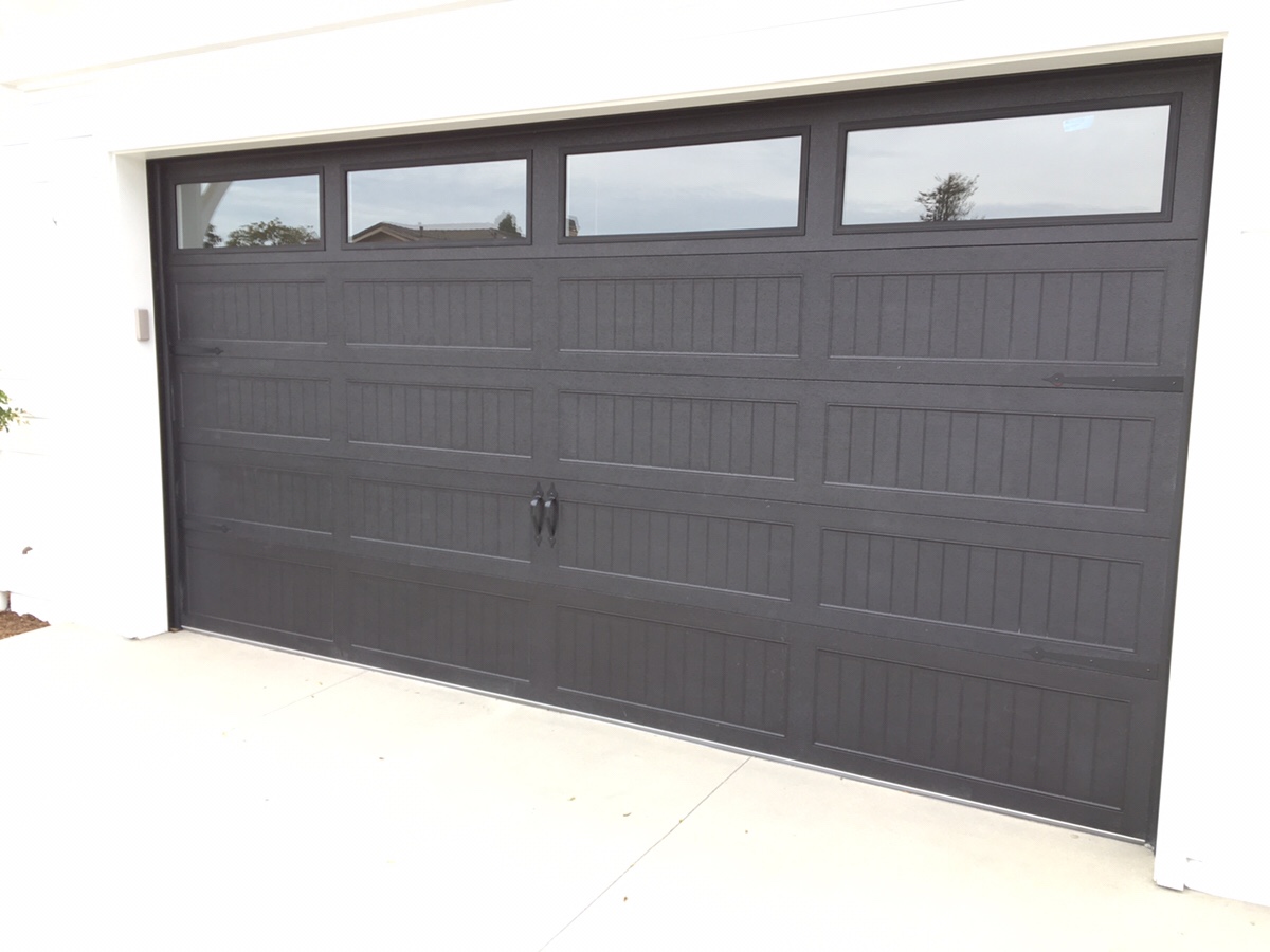 Black Chi Carriage Door In Newport Beach Cityscape Garage Doors