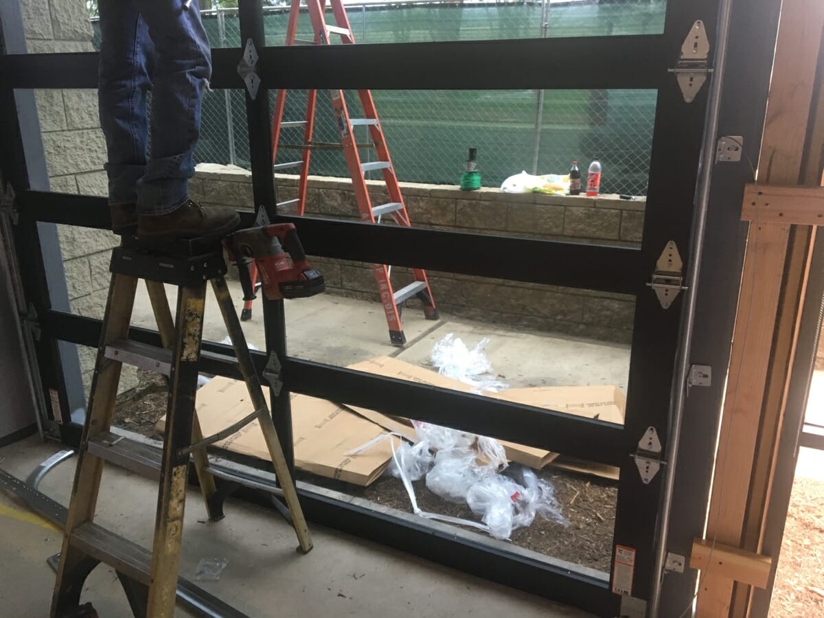 Tinted Glass Door Installation In Costa Mesa CityScape Garage Doors