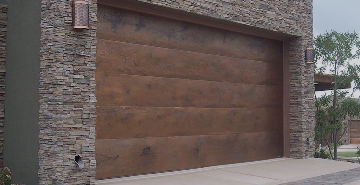 A handcrafted real copper garage door.